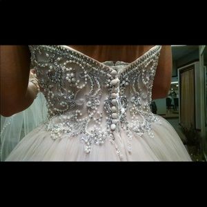 Justin Alexander blush wedding dress